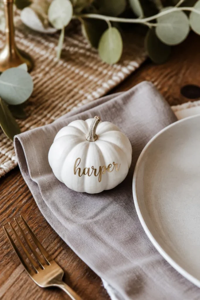 16 Fall Table Decor Ideas That Turn Every Dinner Into an Autumn Celebration 14 fall place setting featuring a small white pumpkin