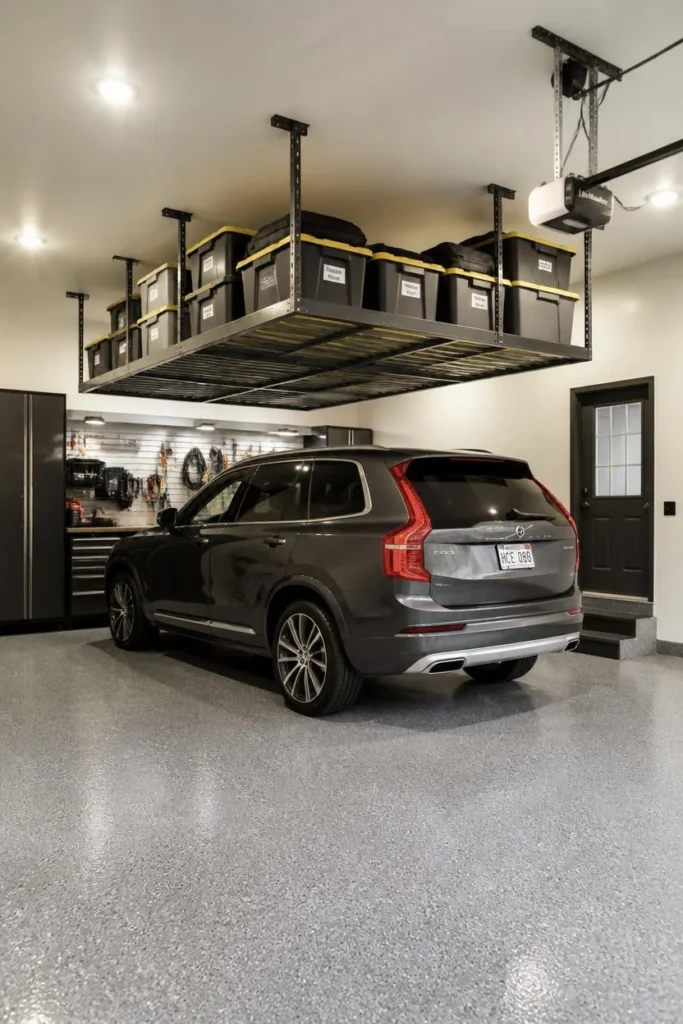 19 Garage Storage Ideas That Finally Tame the Chaos & Look Great Doing It 3 garage wide shot, featuring a steel overhead ceiling storage rack