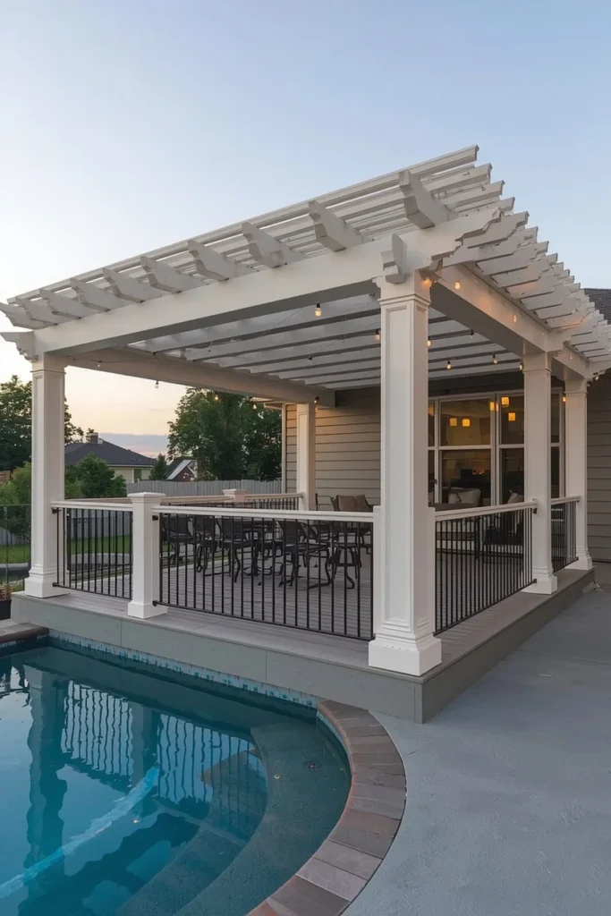 Above ground pool deck with a white wooden pergola 