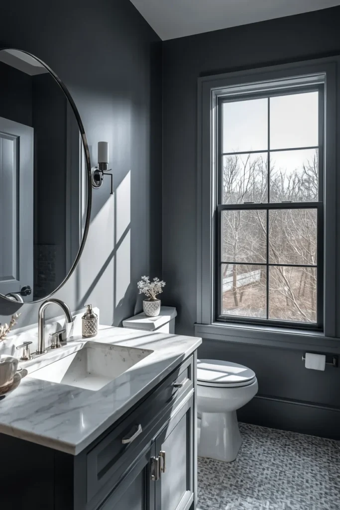 16 Moody Blue Bathroom Ideas That Feel Luxurious & Deeply Relaxing 9 modern bathroom, featuring stormy blue-gray painted walls