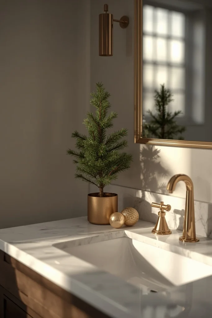 Christmas bathroom vanity, featuring a small potted pine tree in a bronze pot 