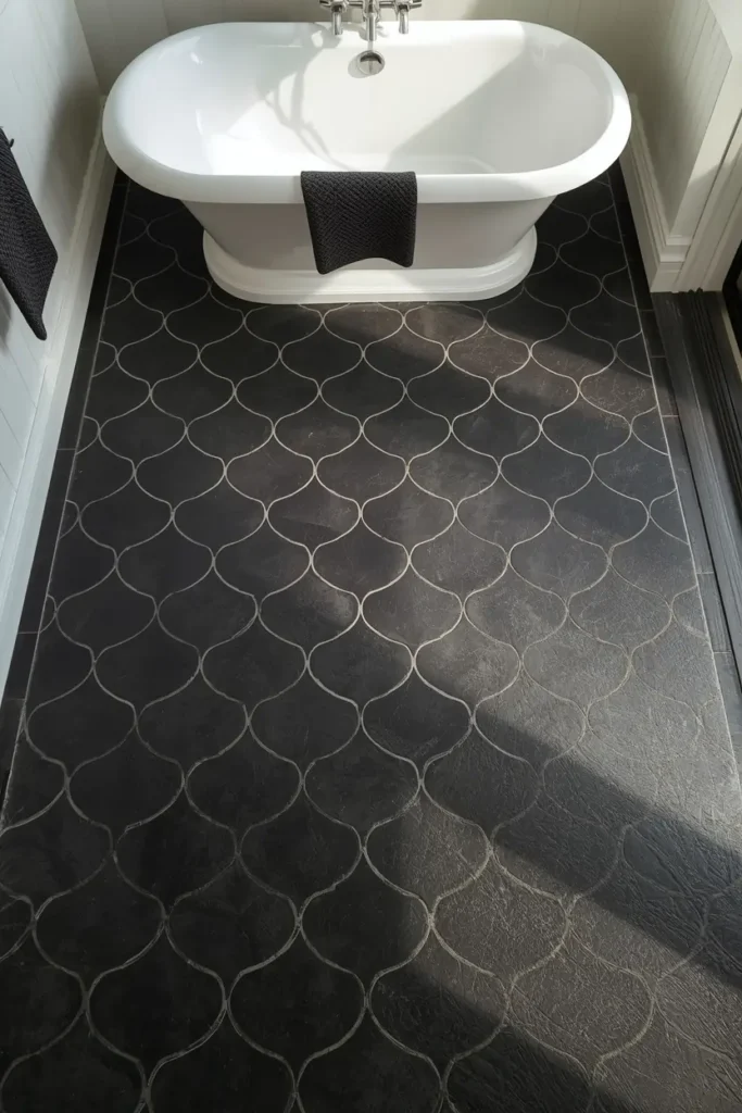 18 Scalloped Tile Ideas for a Soft, Statement-Making Bathroom 15 bathroom floor shot, featuring matte black scalloped tile flooring