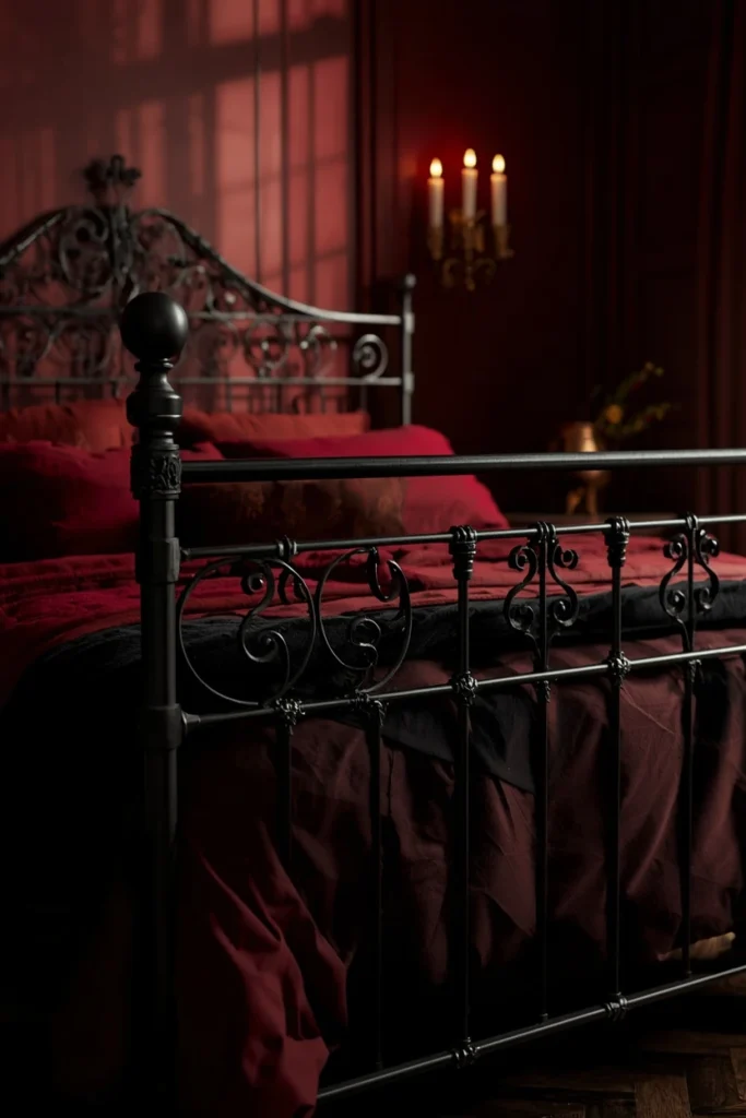21 Vampy Romantic Bedroom Ideas for a Moody, Gothic-Chic Retreat 6 bedroom shot, featuring a dark wrought iron bed frame with ornate scrollwork detailing