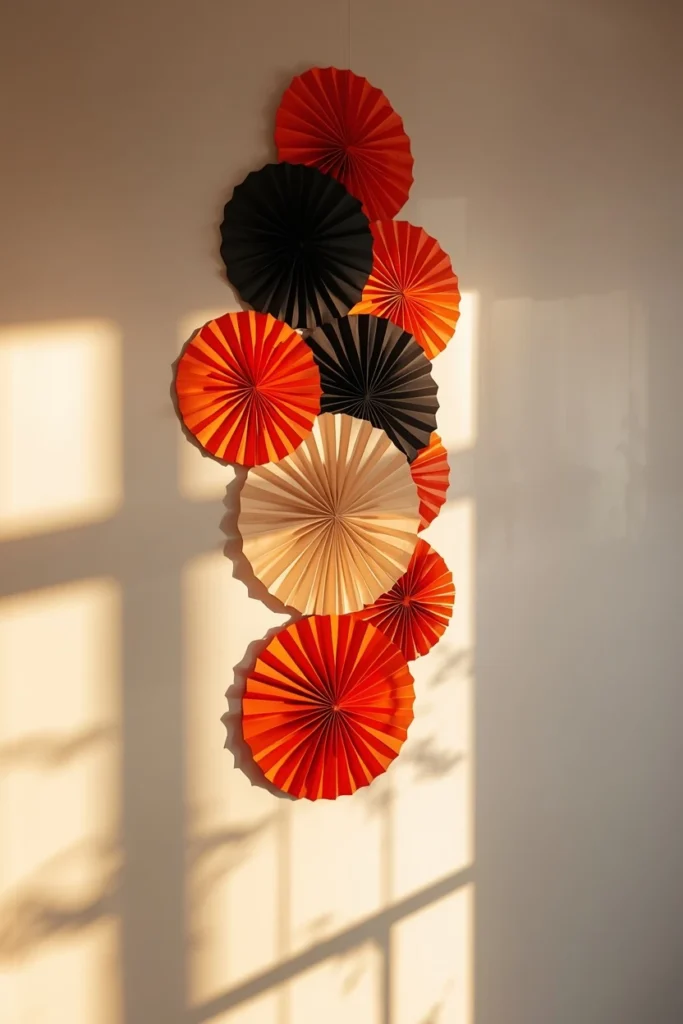 medical waiting room wall, featuring a cascading cluster of folded orange, black,